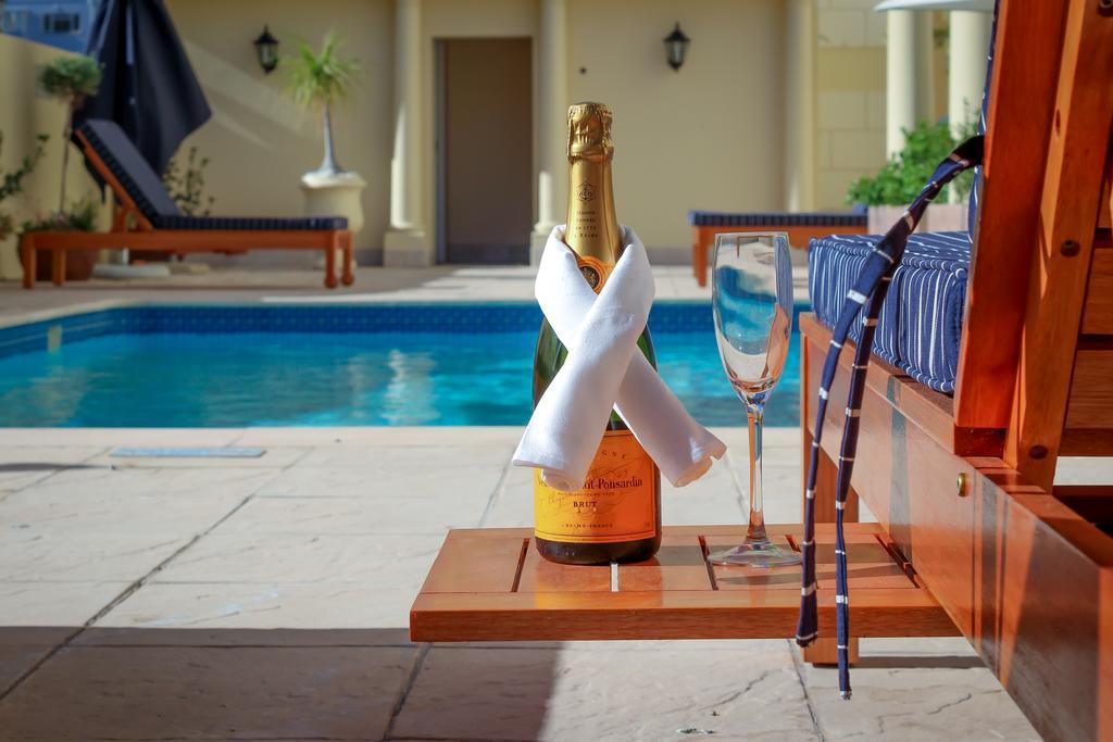 Hotel Le Vendome Cape Town Exterior photo A bottle of Veuve Clicquot